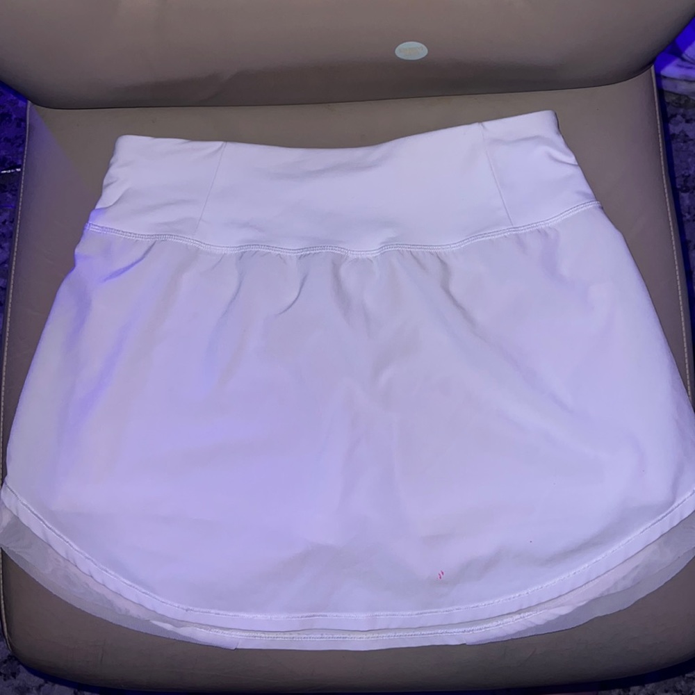 Selling this skirt! Only been worn once, its white, and medium size.
